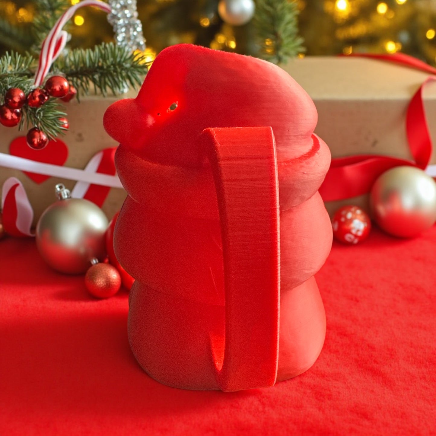 3D printed “Charlie the Chubby” Drinky thing  with his Santa hat.